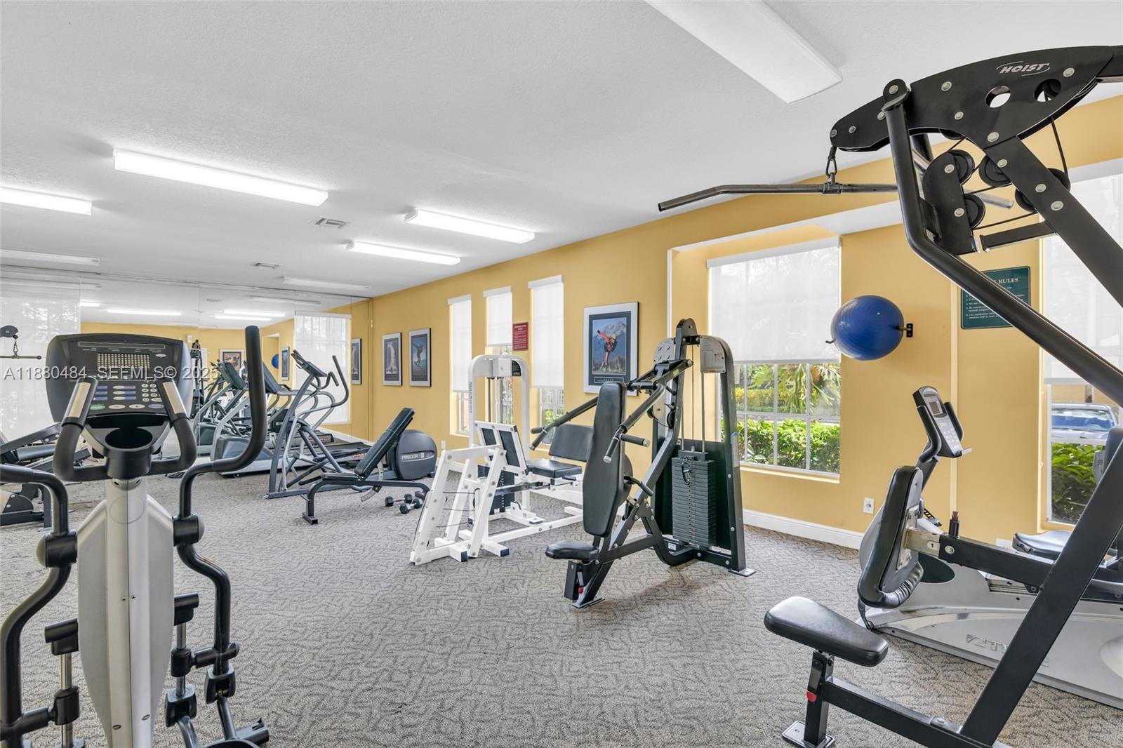 1255 Southwest 46th Avenue, Unit 1713 Pompano Beach, FL 33069 - Photo 31 of 37 a view of a room with gym equipment