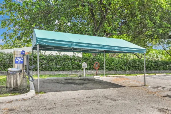 a backyard of a house with a garden and entertaining space