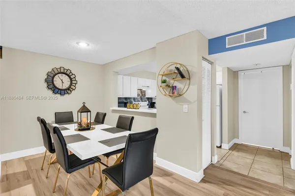 a view of a dining room with furniture