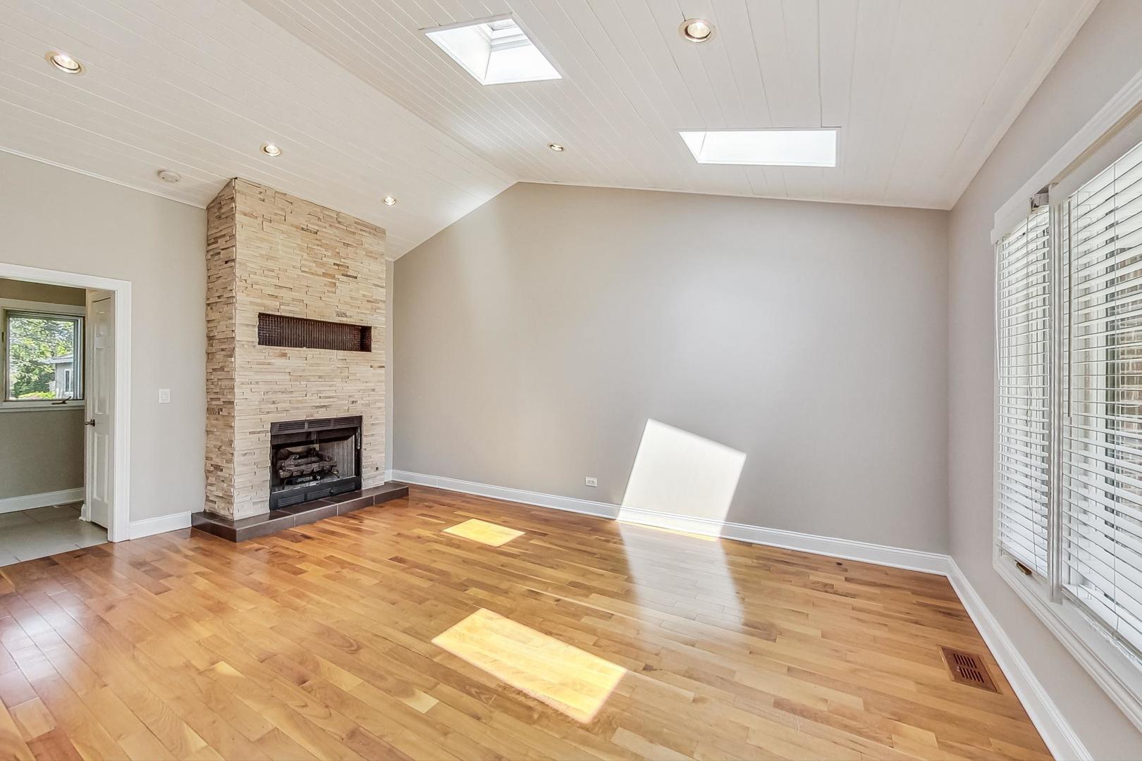 2030 Clover Road Northbrook, IL 60062 - Photo 16 of 44 a view of a livingroom with a fireplace