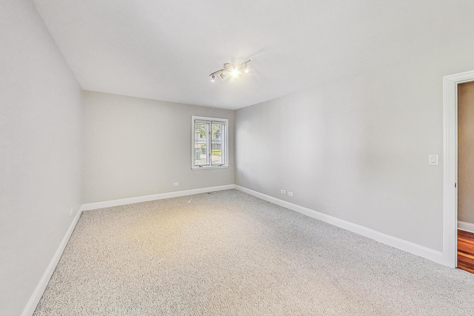 2030 Clover Road Northbrook, IL 60062 - Photo 20 of 44 an empty room with a window