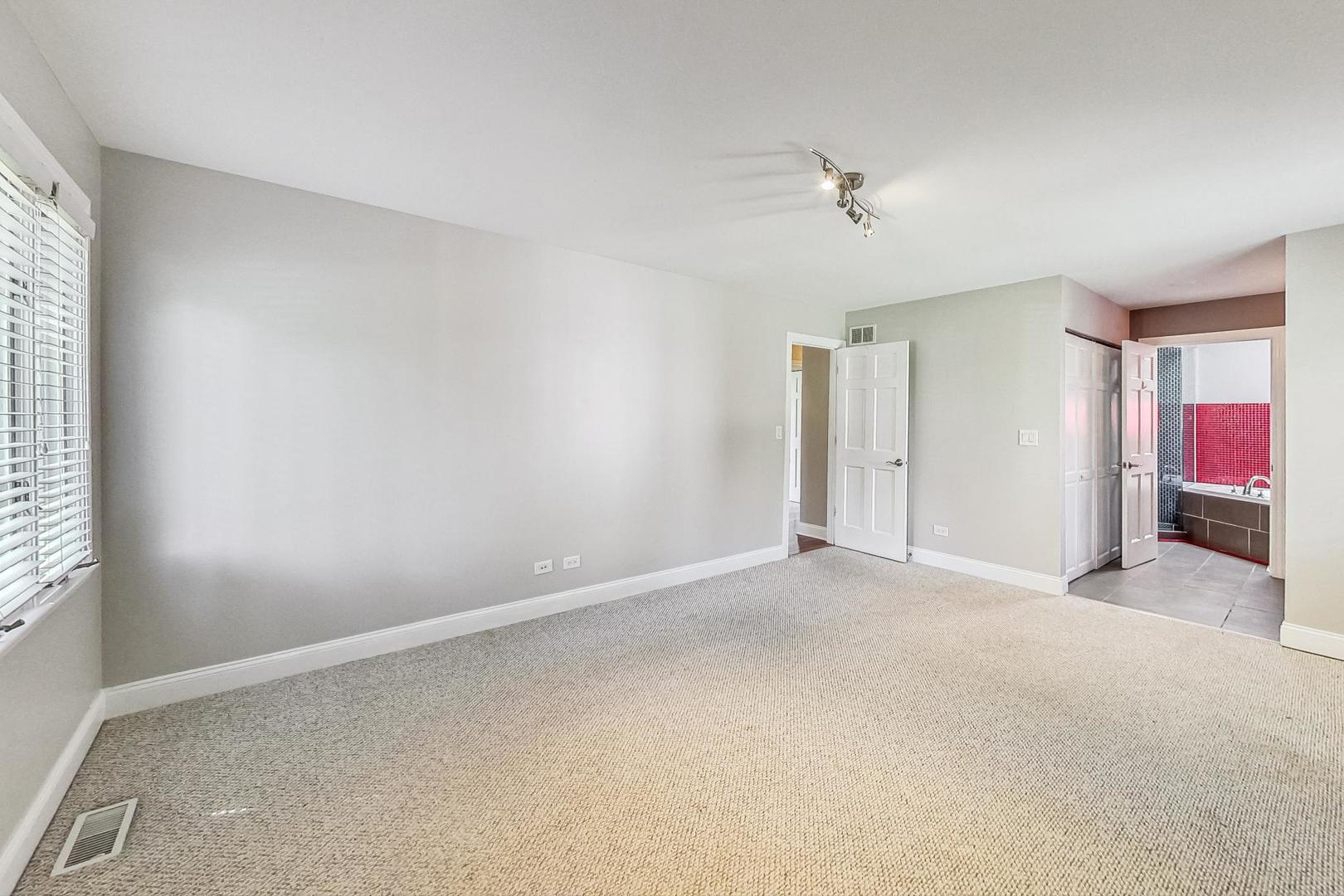 2030 Clover Road Northbrook, IL 60062 - Photo 21 of 44 a view of an empty room with a window