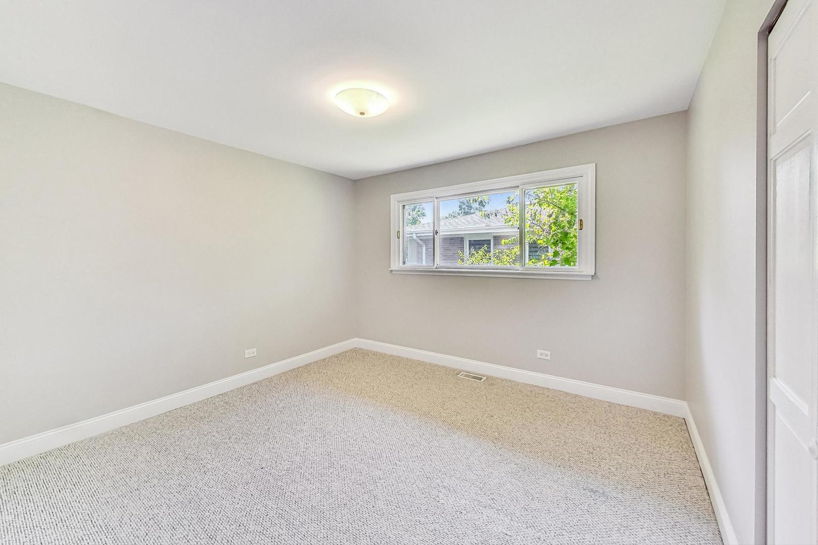 2030 Clover Road Northbrook, IL 60062 - Photo 25 of 44 an empty room with windows