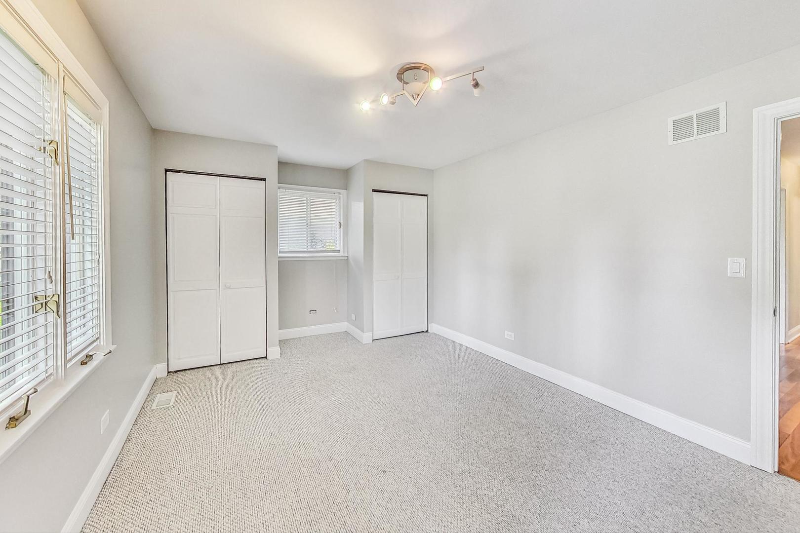 2030 Clover Road Northbrook, IL 60062 - Photo 30 of 44 a view of an empty room with a window