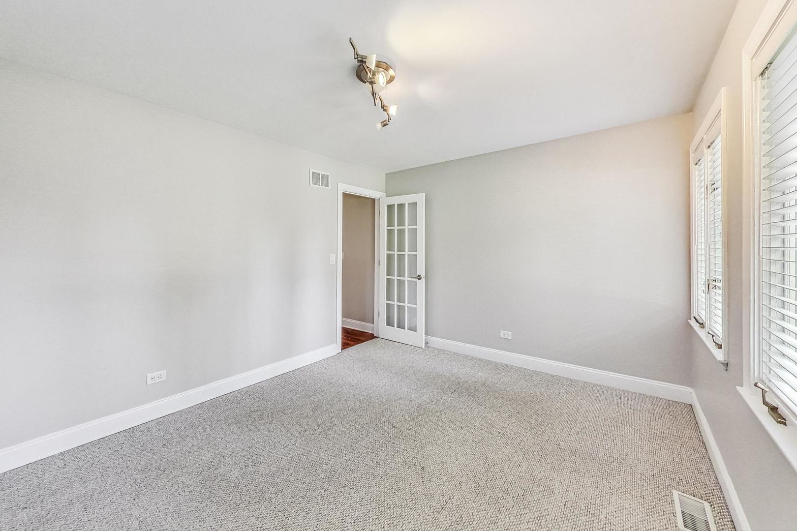 2030 Clover Road Northbrook, IL 60062 - Photo 31 of 44 a view of an empty room with a window