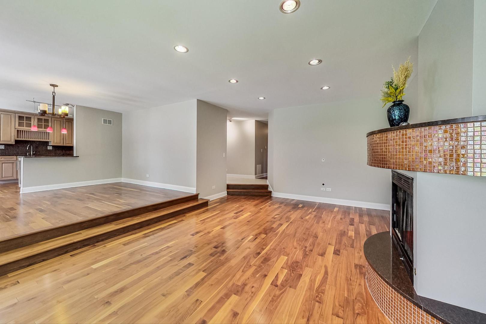 2030 Clover Road Northbrook, IL 60062 - Photo 8 of 44 a view of a room with wooden floor and chair
