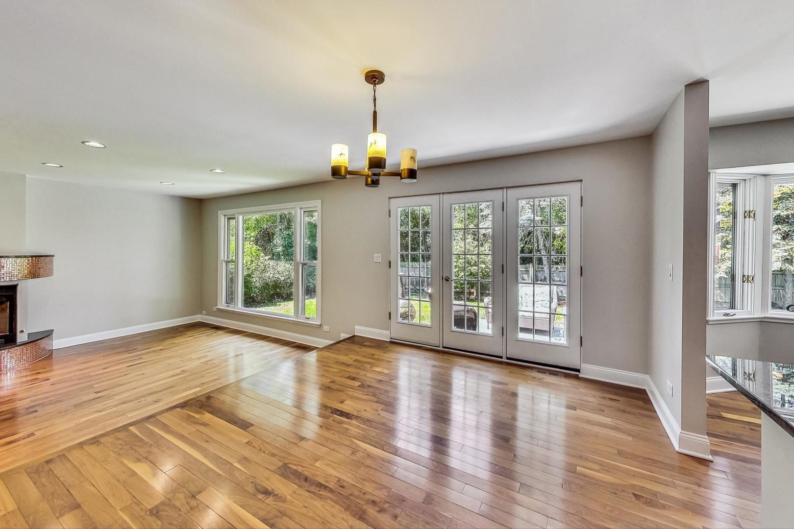2030 Clover Road Northbrook, IL 60062 - Photo 10 of 44 a view of an empty room with wooden floor and a window
