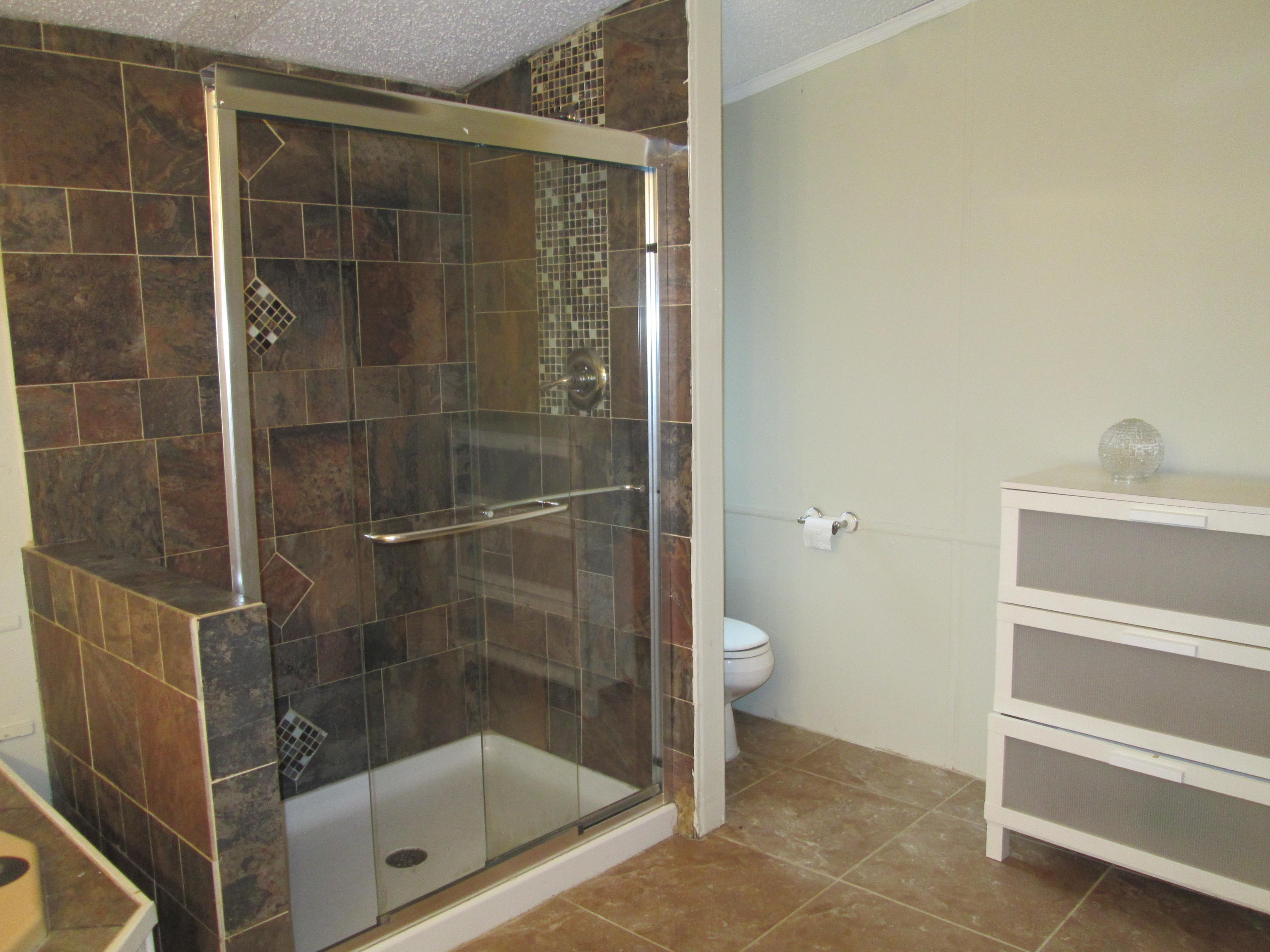 2765 Ola Broxson Road Navarre, FL 32566 - Photo 16 of 20 a bathroom with a shower
