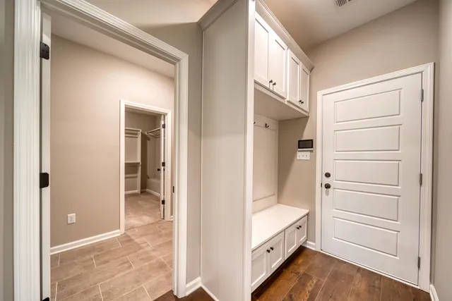 a bathroom with a tub and shower