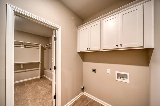 a view of cabinets and window