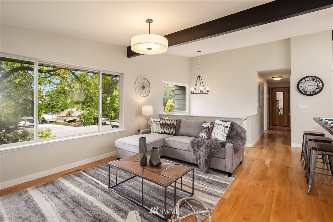 9229 217th Place Southwest Edmonds, WA 98020 - Photo 11 of 38 a living room with furniture and a large window