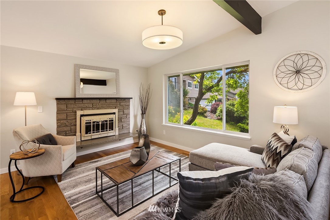 9229 217th Place Southwest Edmonds, WA 98020 - Photo 12 of 38 a living room with furniture and a fireplace