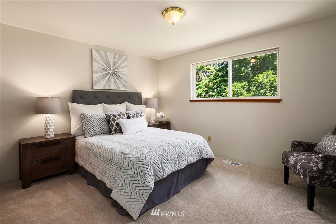 9229 217th Place Southwest Edmonds, WA 98020 - Photo 15 of 38 a bedroom with a bed and a window