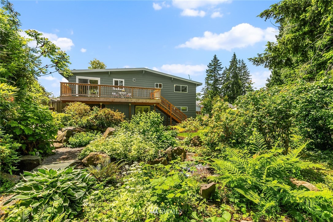 9229 217th Place Southwest Edmonds, WA 98020 - Photo 26 of 38 a front view of a house with a yard