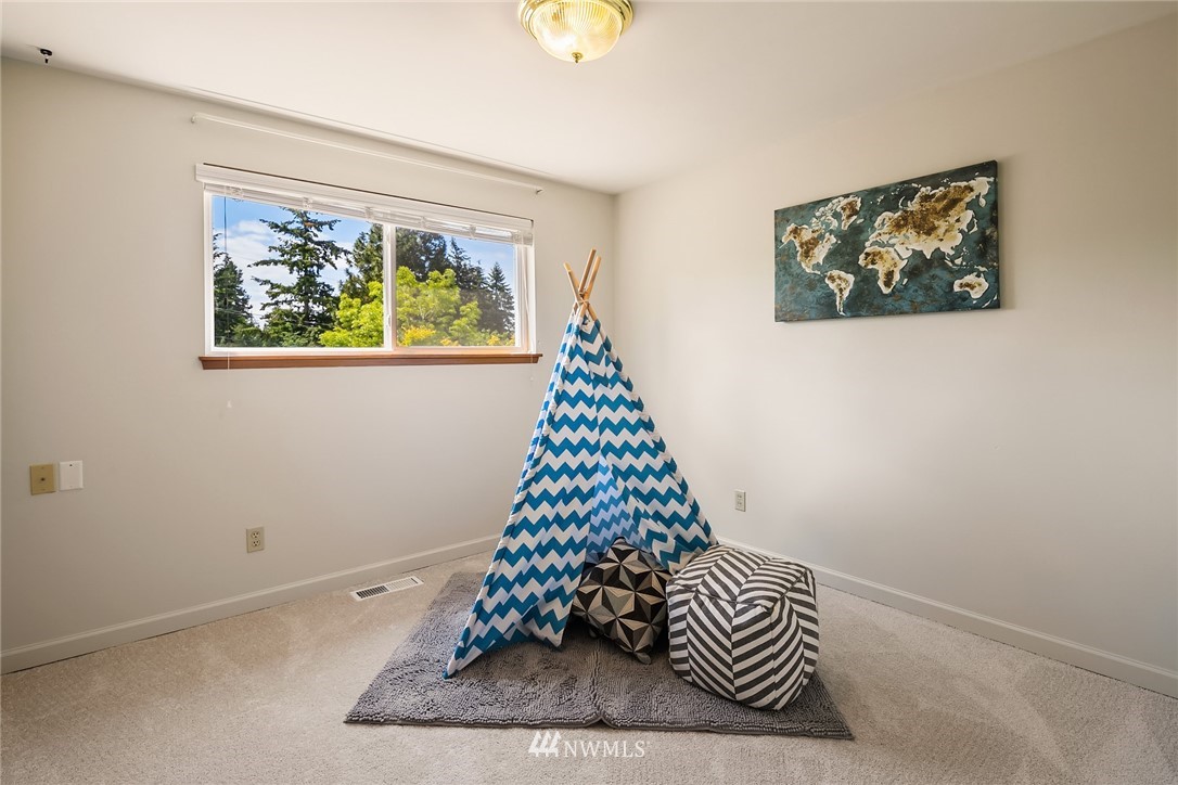 9229 217th Place Southwest Edmonds, WA 98020 - Photo 28 of 38 a room with toys and a window