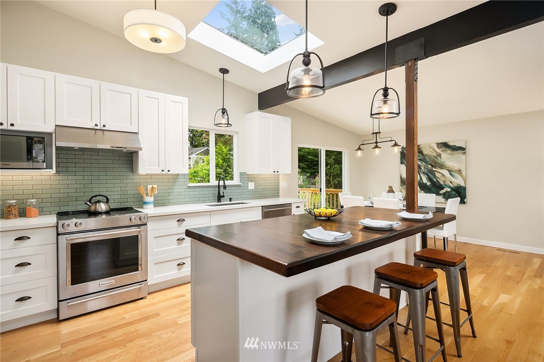 9229 217th Place Southwest Edmonds, WA 98020 - Photo 4 of 38 a kitchen with a sink cabinets and wooden floor