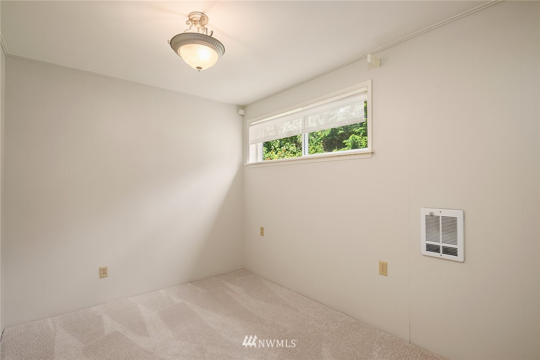 9229 217th Place Southwest Edmonds, WA 98020 - Photo 31 of 38 an empty room with windows