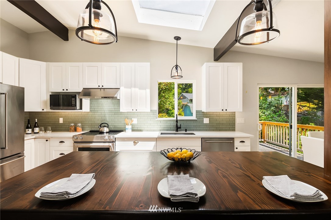9229 217th Place Southwest Edmonds, WA 98020 - Photo 5 of 38 a kitchen with a sink and white appliances