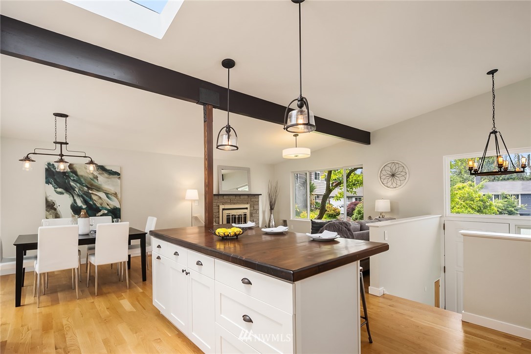 9229 217th Place Southwest Edmonds, WA 98020 - Photo 6 of 38 a kitchen with stainless steel appliances granite countertop a sink and a refrigerator