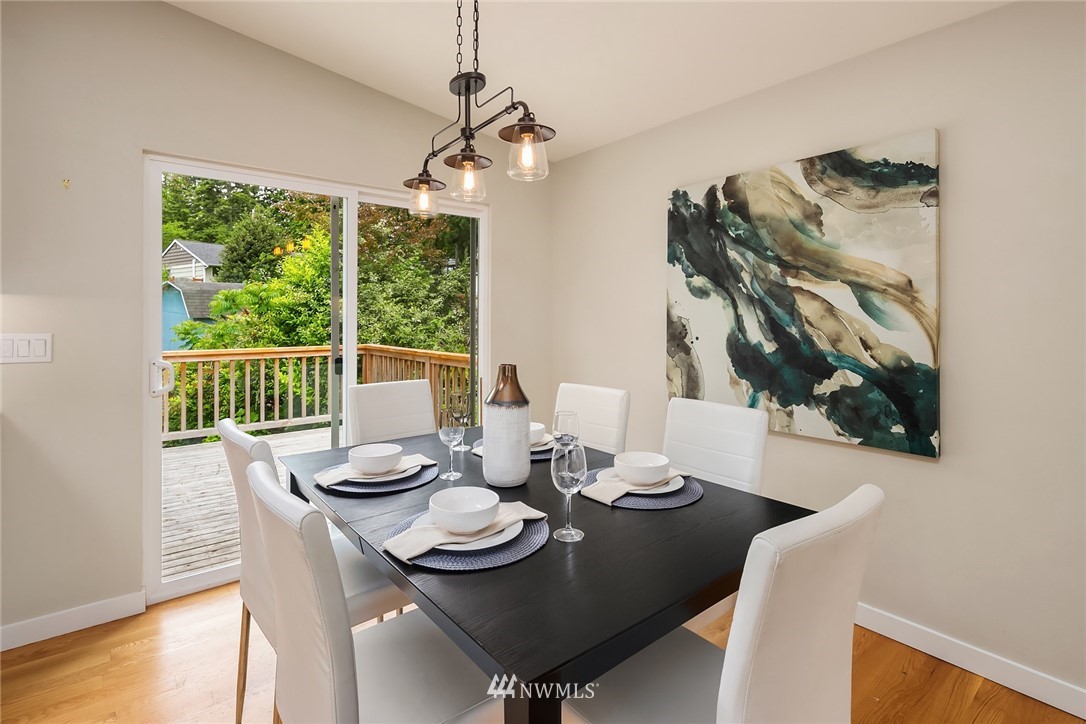 9229 217th Place Southwest Edmonds, WA 98020 - Photo 9 of 38 a view of a dining room with furniture window and wooden floor
