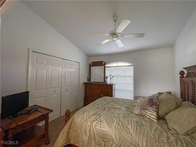 a bathroom with a toilet a sink and a mirror