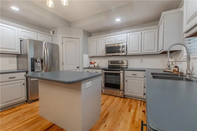 $392,500 | 411 Eagle Glen Drive, Raymore, MO 64083