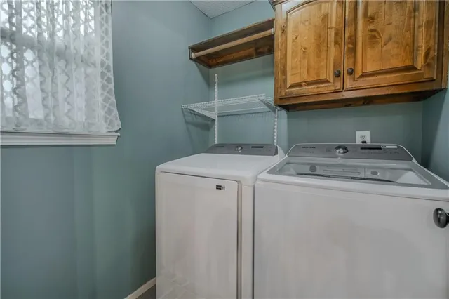 $392,500 | 411 Eagle Glen Drive, Raymore, MO 64083