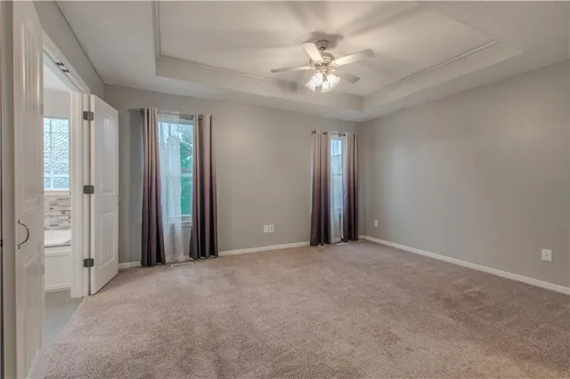 $392,500 | 411 Eagle Glen Drive, Raymore, MO 64083