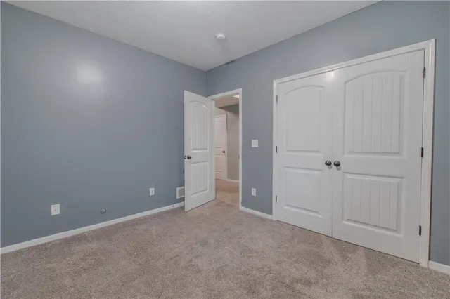 $392,500 | 411 Eagle Glen Drive, Raymore, MO 64083