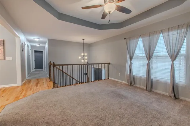 $392,500 | 411 Eagle Glen Drive, Raymore, MO 64083