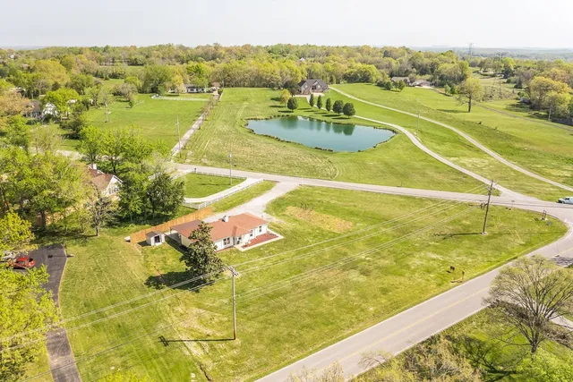 a view of an outdoor space and swimming pool