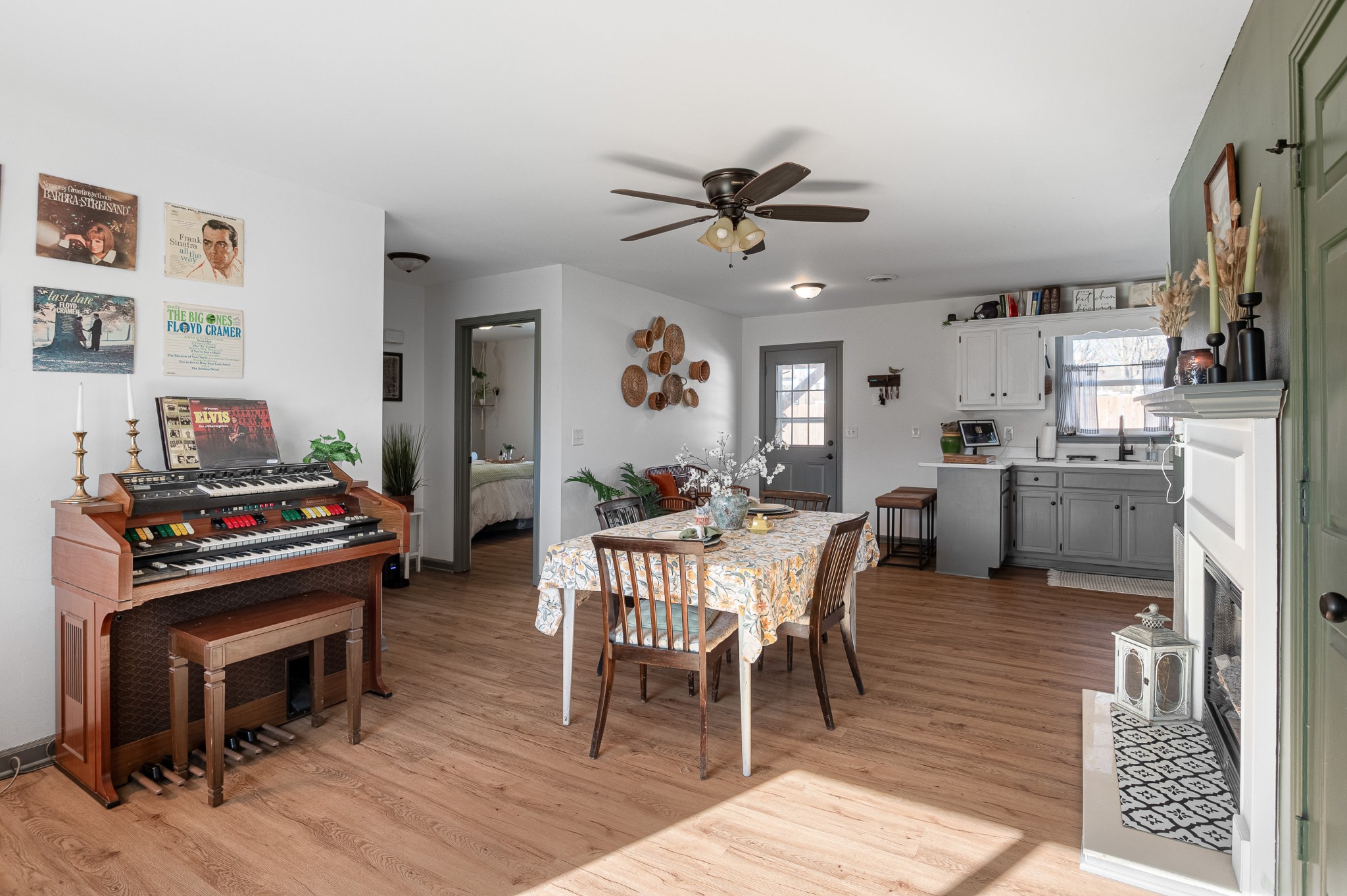 8522 Coles Ferry Pike Lebanon, TN 37087 - Photo 19 of 35 a living room with furniture a fireplace and a flat screen tv