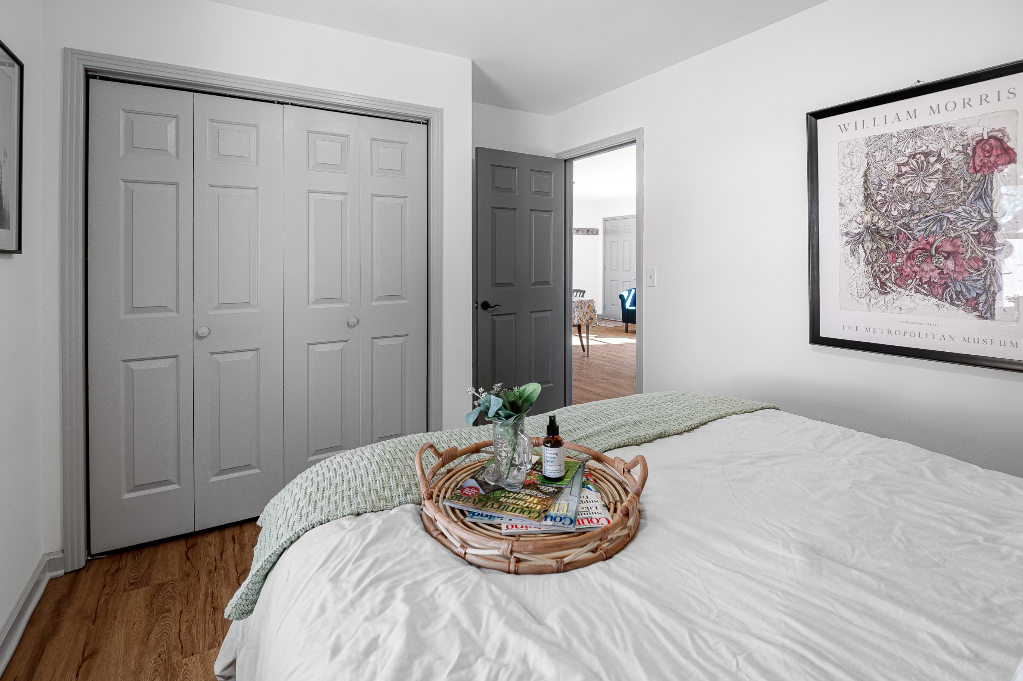 8522 Coles Ferry Pike Lebanon, TN 37087 - Photo 21 of 35 a bedroom with a bed and a painting on the wall