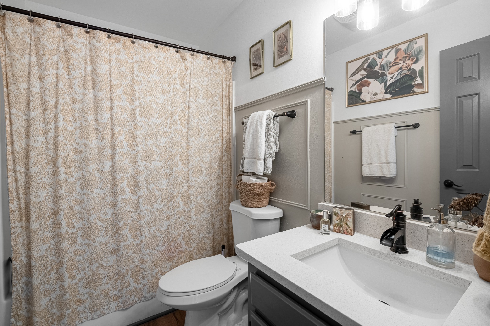 8522 Coles Ferry Pike Lebanon, TN 37087 - Photo 24 of 35 a bathroom with a sink a toilet and a mirror