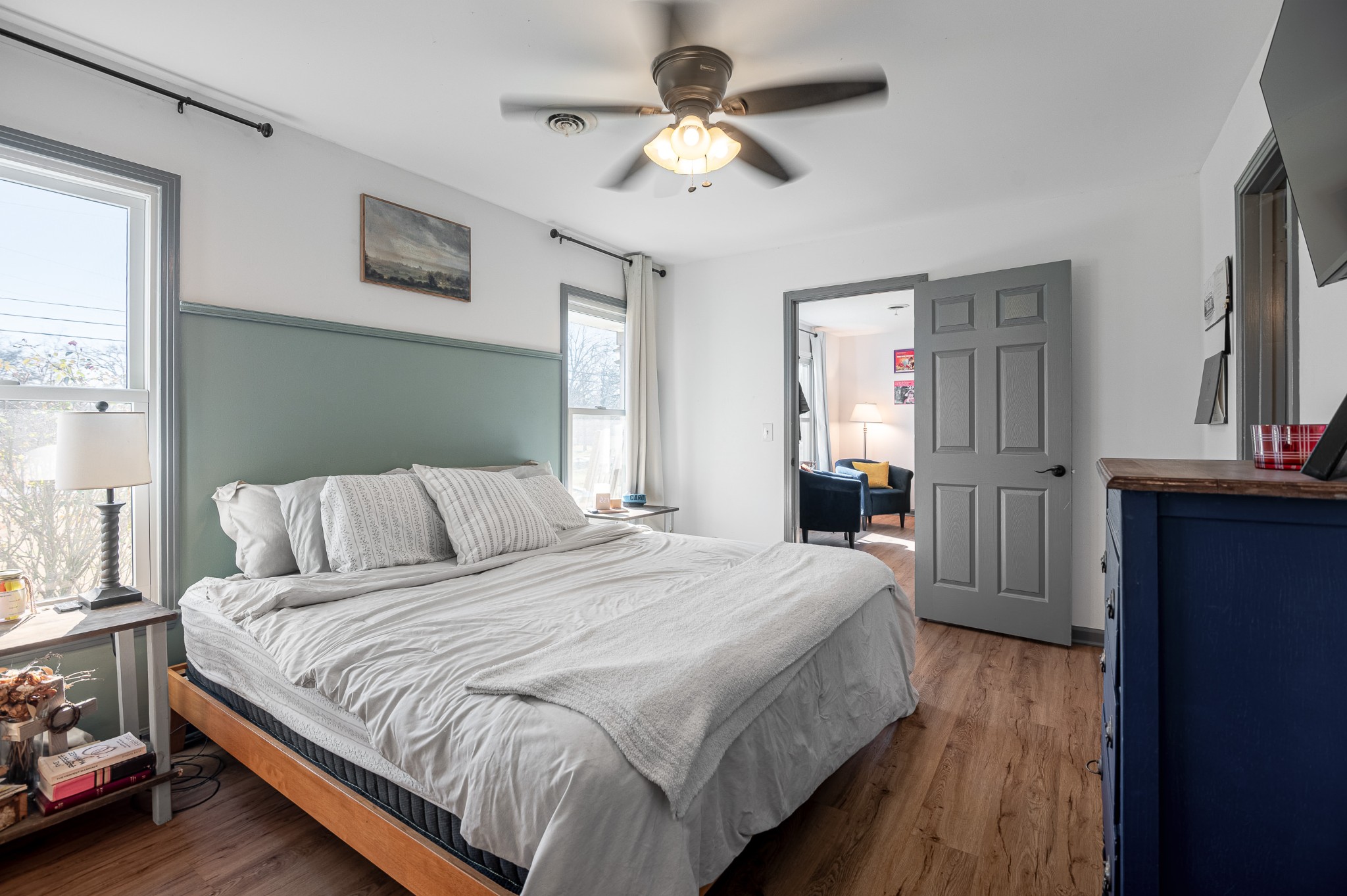 8522 Coles Ferry Pike Lebanon, TN 37087 - Photo 27 of 35 a spacious bedroom with a bed and a chandelier