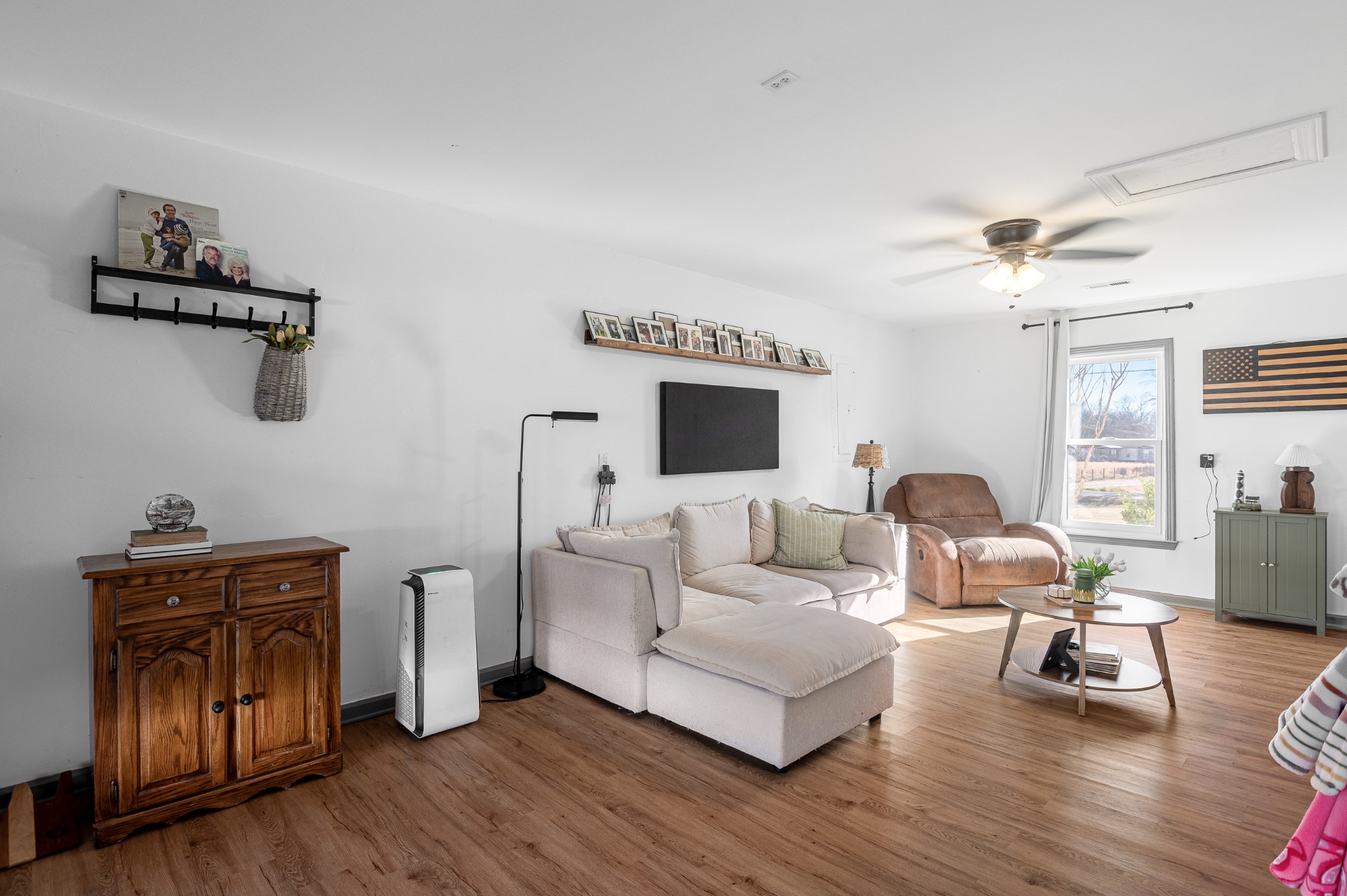8522 Coles Ferry Pike Lebanon, TN 37087 - Photo 7 of 35 a living room with furniture and wooden floor