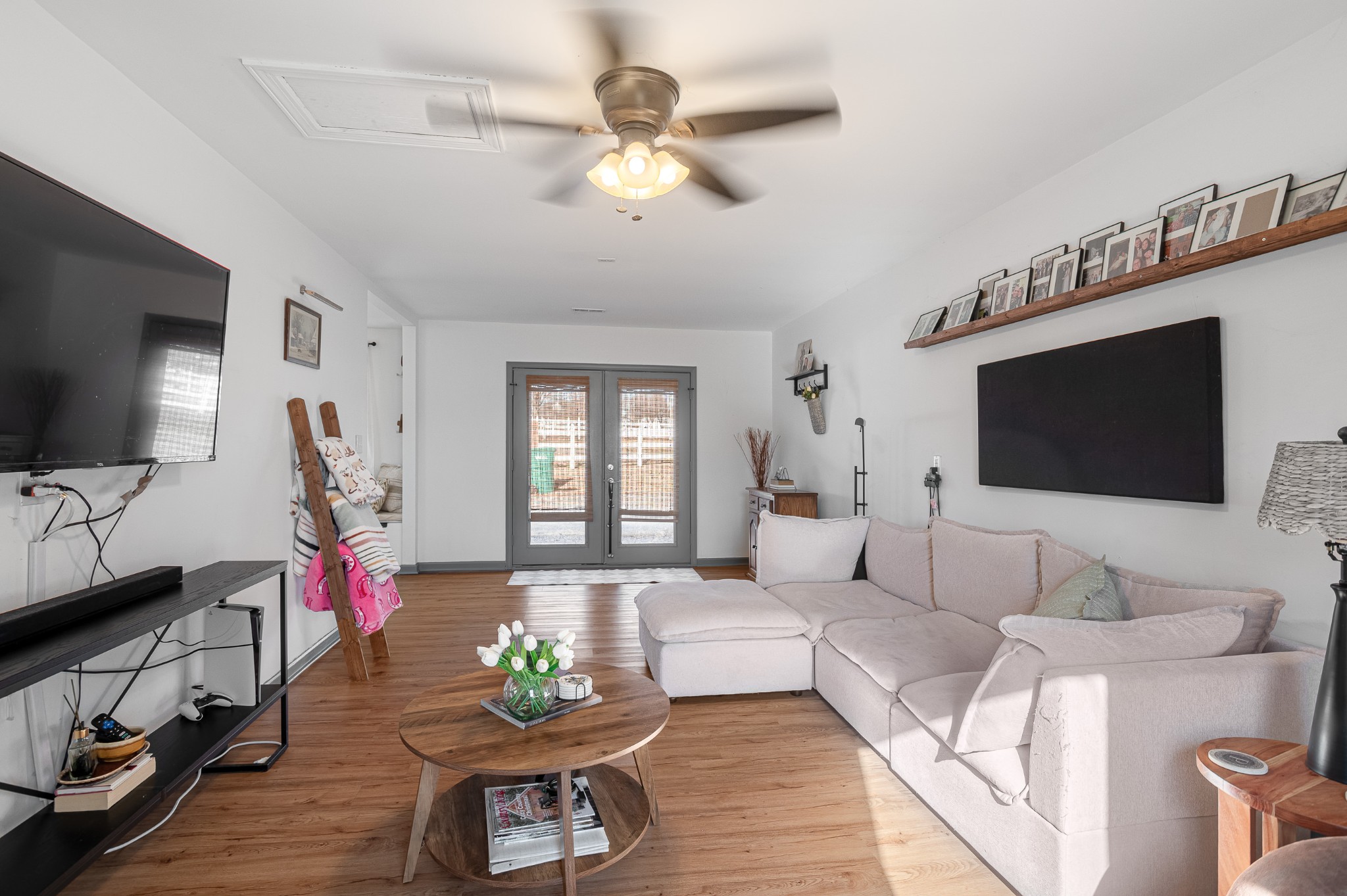 8522 Coles Ferry Pike Lebanon, TN 37087 - Photo 8 of 35 a living room with furniture a flat screen tv and a window