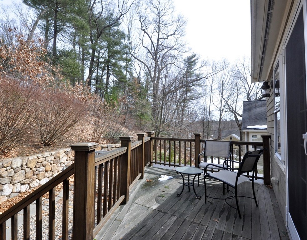 24 Ridge Road Concord, MA 01742 - Photo 21 of 25 a view of a chairs and table on the deck