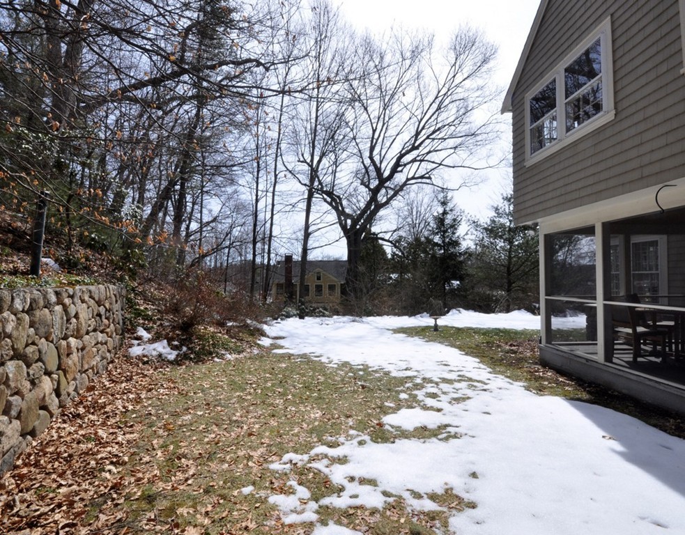 24 Ridge Road Concord, MA 01742 - Photo 23 of 25 a street view covered with snow