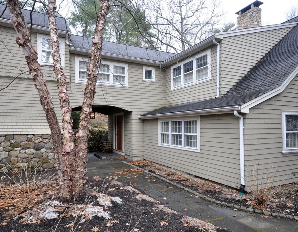 24 Ridge Road Concord, MA 01742 - Photo 25 of 25 a front view of a house with garage