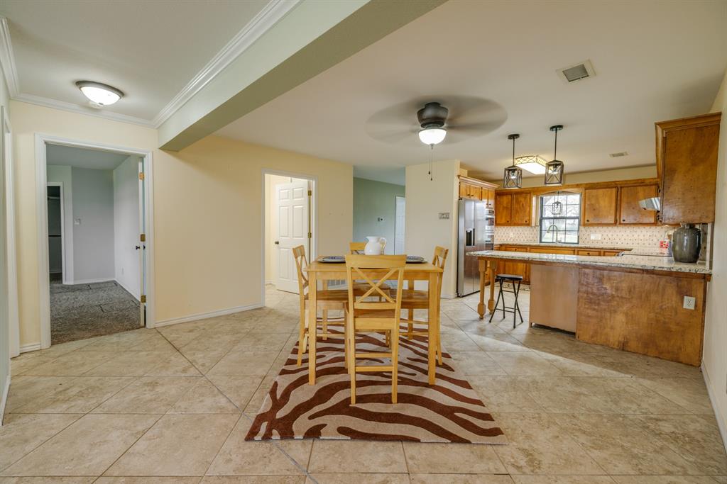103 Arrow Point Abilene, TX 79601 - Photo 11 of 40 a view of a kitchen and dining room