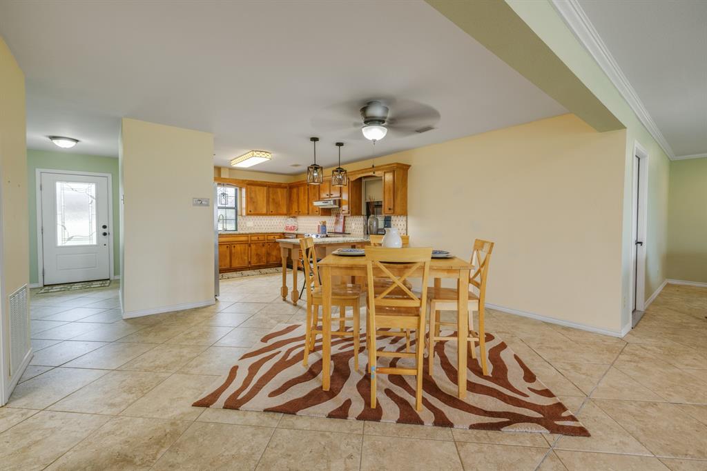 103 Arrow Point Abilene, TX 79601 - Photo 12 of 40 a view of a dining room with furniture