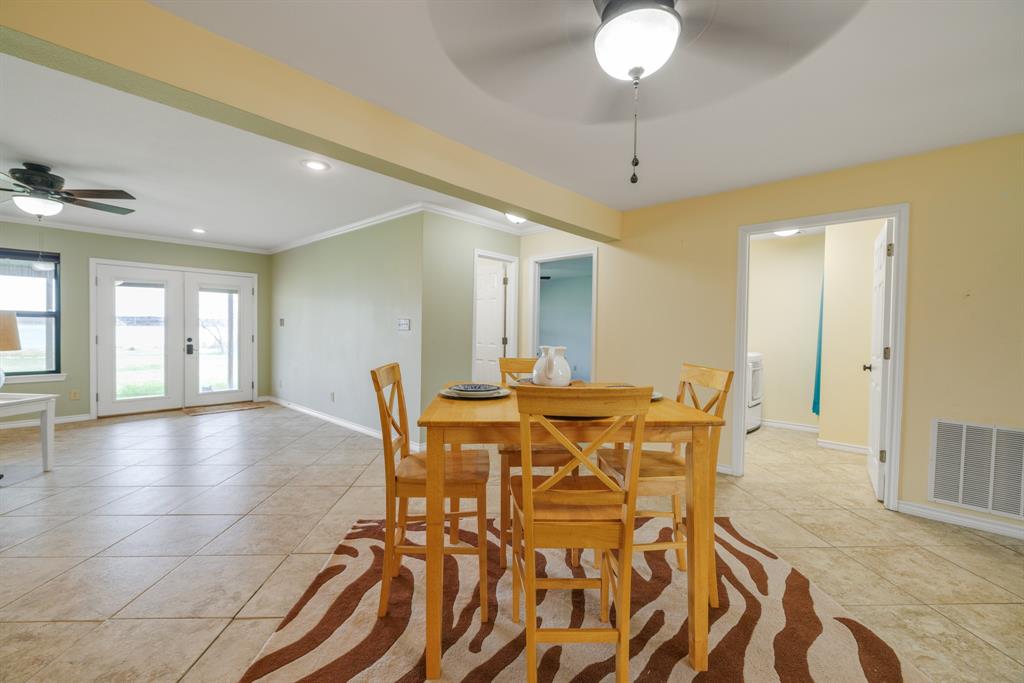103 Arrow Point Abilene, TX 79601 - Photo 14 of 40 a view of a dining room with furniture and wooden floor