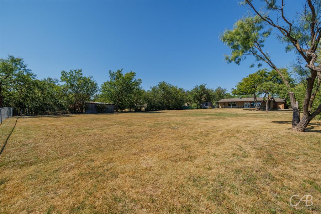 103 Arrow Point Abilene, TX 79601 - Photo 36 of 40 a view of a field with a tree