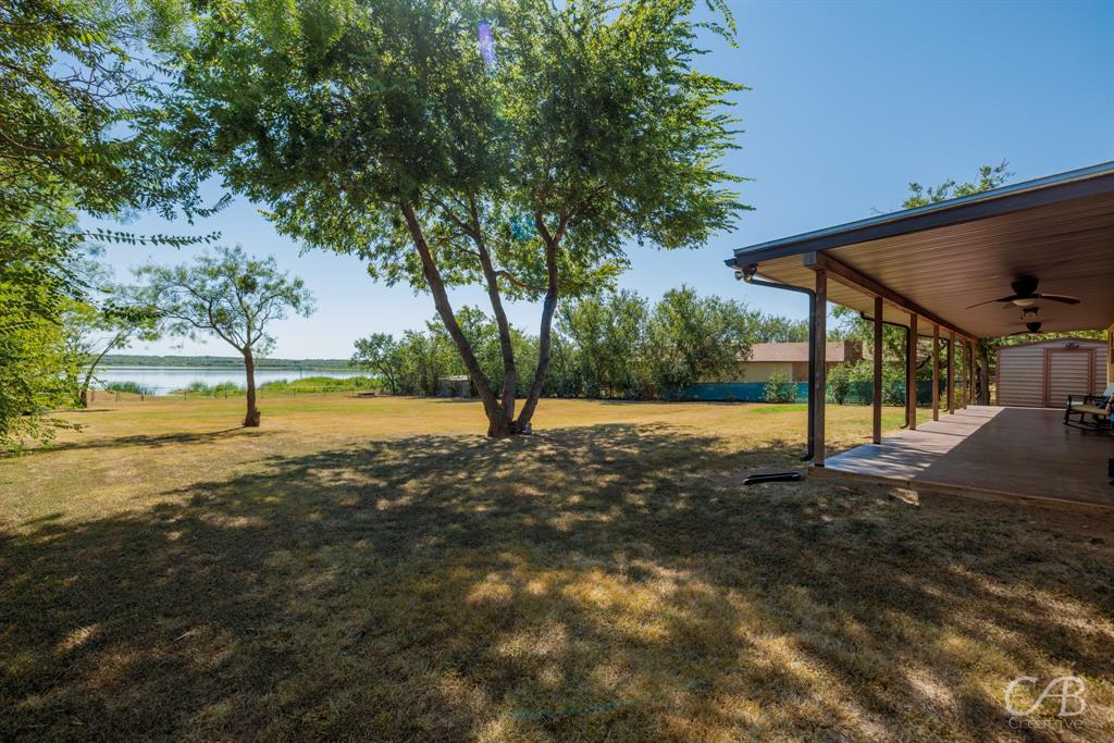 103 Arrow Point Abilene, TX 79601 - Photo 38 of 40 a view of a yard with a tree