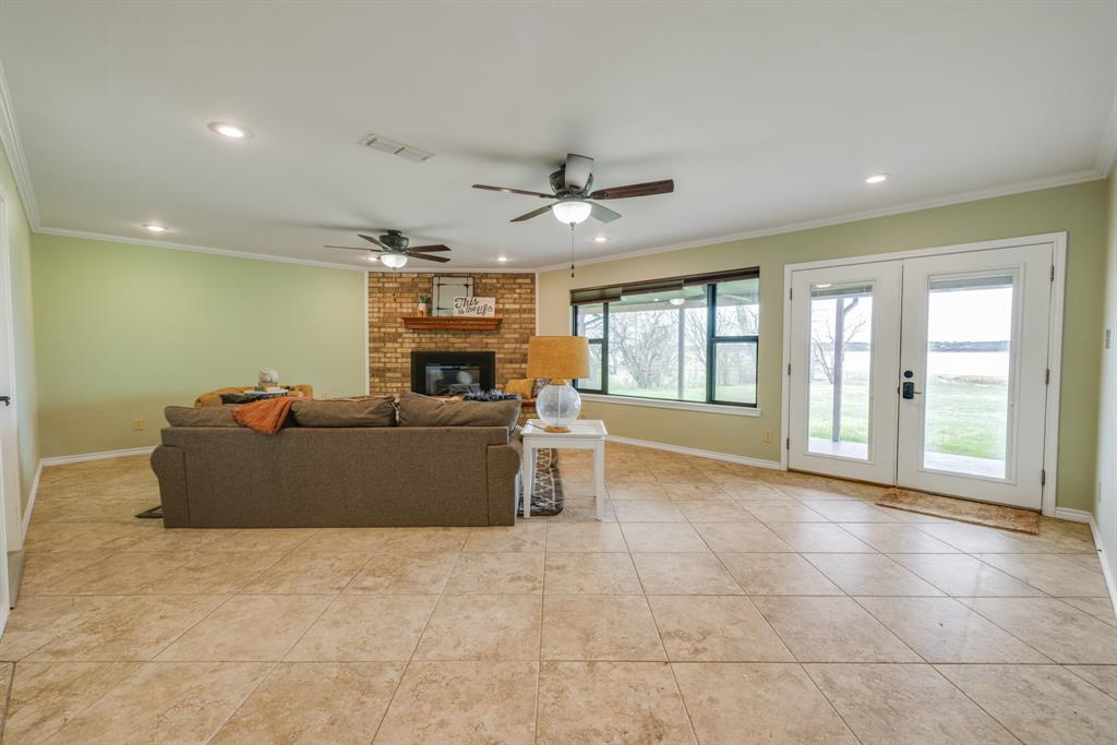 103 Arrow Point Abilene, TX 79601 - Photo 9 of 40 a living room with furniture and a large window