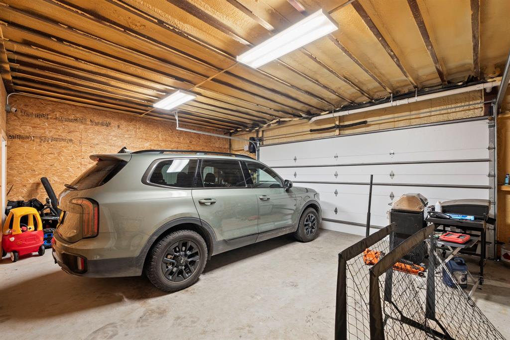 1404 McConnell Road Gunter, TX 75058 - Photo 18 of 27 a view of car garage
