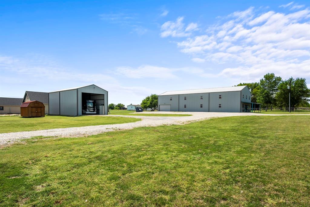 1404 McConnell Road Gunter, TX 75058 - Photo 25 of 27 a view of house with a big yard