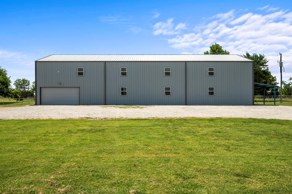 1404 McConnell Road Gunter, TX 75058 - Photo 4 of 27 a view of a back yard