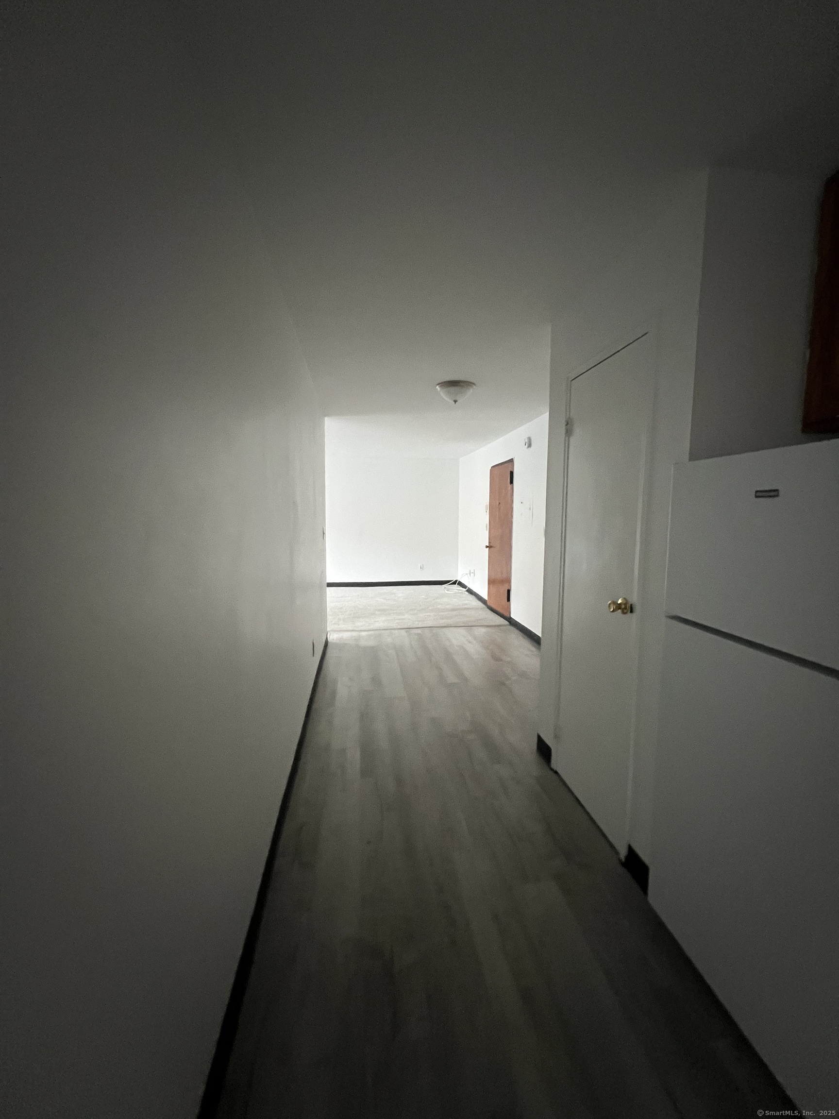360 Palisade Avenue, Unit B09 Bridgeport, CT 06610 - Photo 8 of 8 a view of hallway with wooden floor